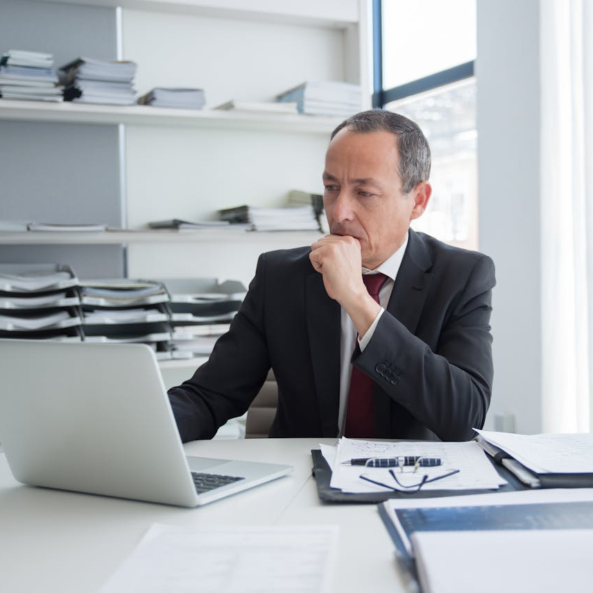 Federal employee reviewing TSP strategy and avoiding costly retirement mistakes