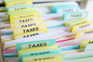 File cabinet filled with tax documents, representing financial organization and record-keeping.